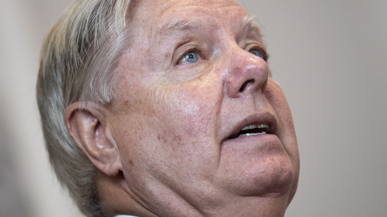 Lindsey Graham looking up