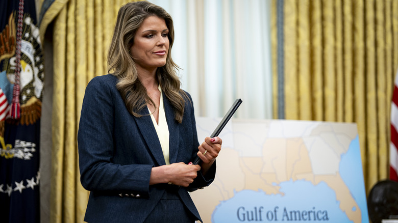 Lindsey Halligan standing in the Oval Office