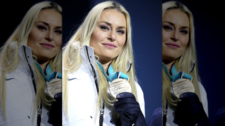 Lindsey Vonn holding bronze medal PyeongChang Olympics