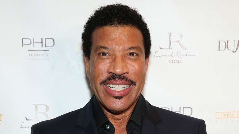 Lionel Richie smiling at an event