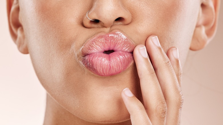 woman puckering lips