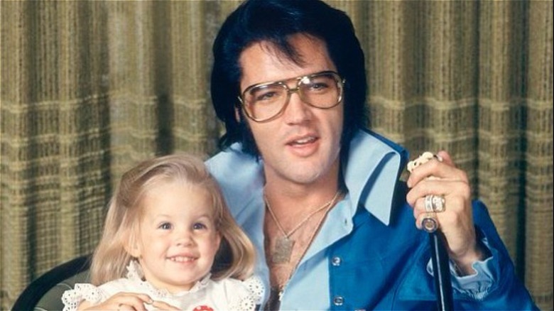 Lisa Marie Presley as a toddler with Elvis Presley