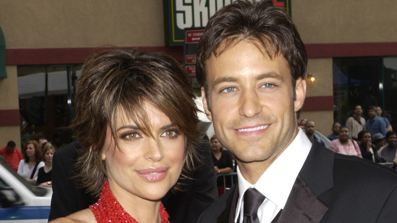 Lisa Rinna posing with Ty Treadway