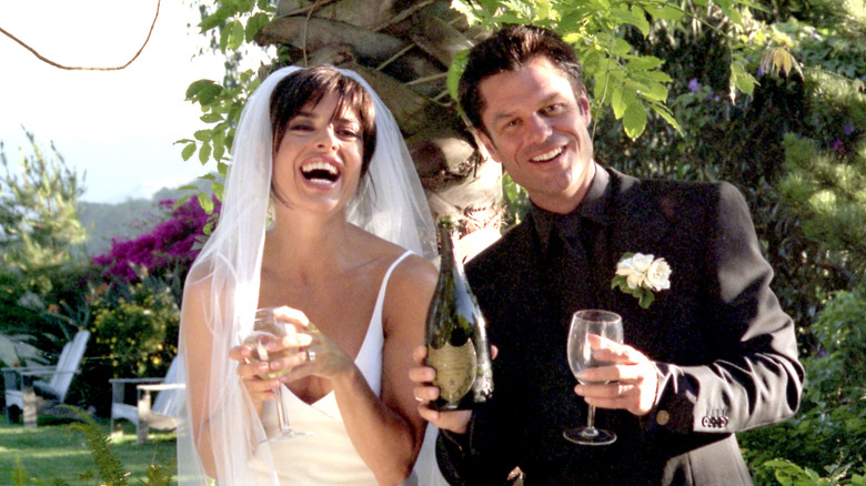 Lisa Rinna and Harry Hamlin with champagne at their wedding