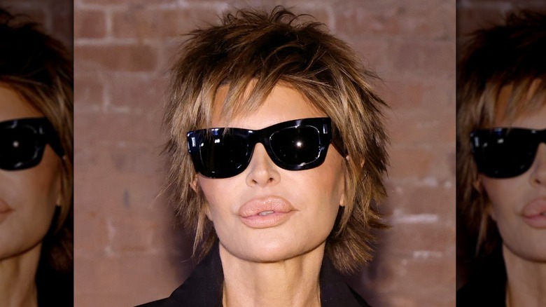 Lisa Rinna black top, sunglasses