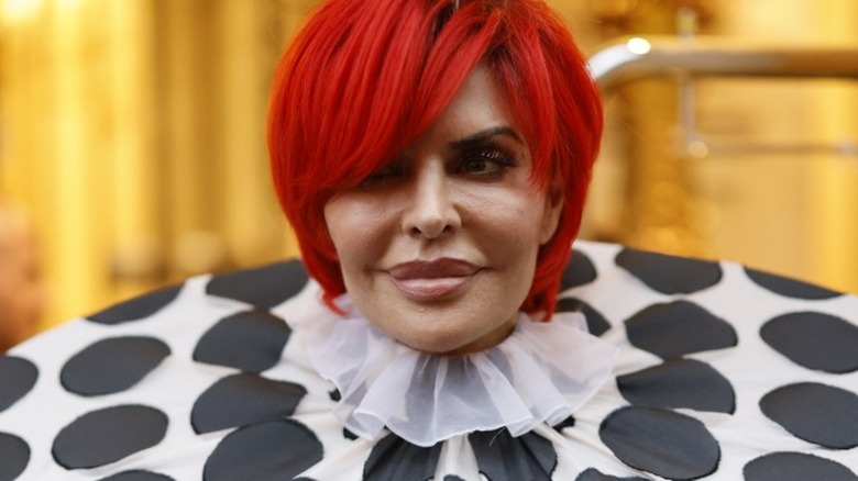 Lisa Rinna red wig, statement high fashion top