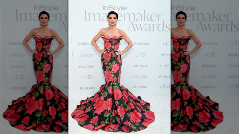 Lisa Rinna in a mermaid-tail gown with floral pattern