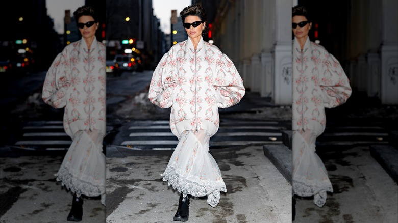 Lisa Rinna in an oversized floral jacket with a lace skirt