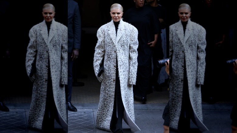 Lisa Rinna in an oversized animal print coat with bleached hair