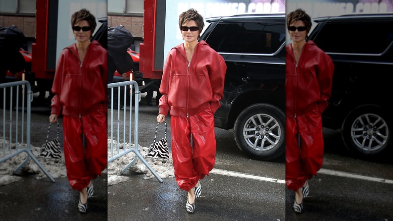 Lisa Rinna in a monochrome red outfit on a New York street