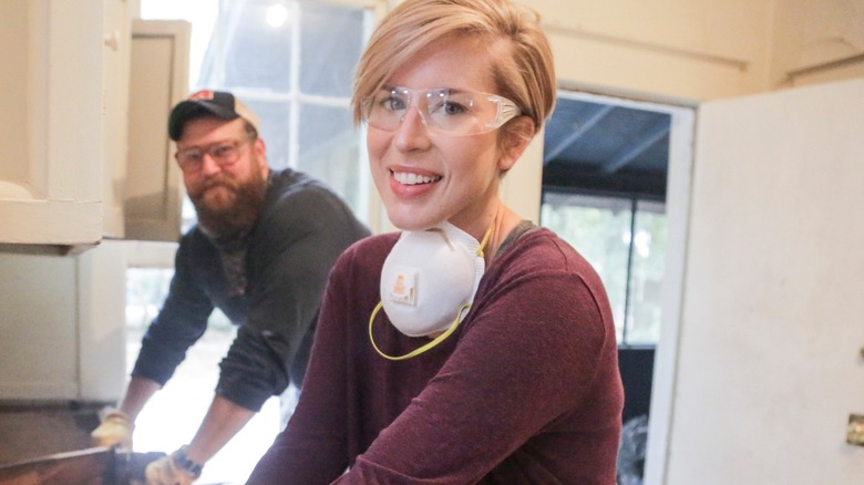 Erin Napier wearing safety glasses in a still from "Home Town"