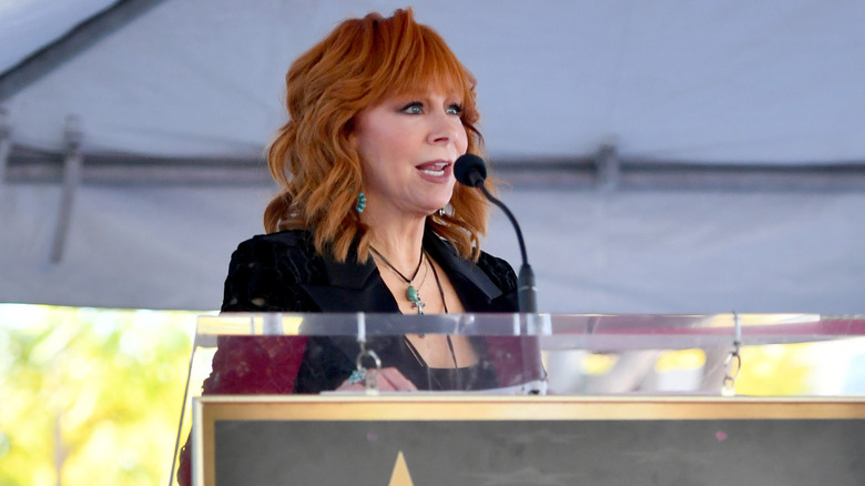 Reba McEntire giving a speech
