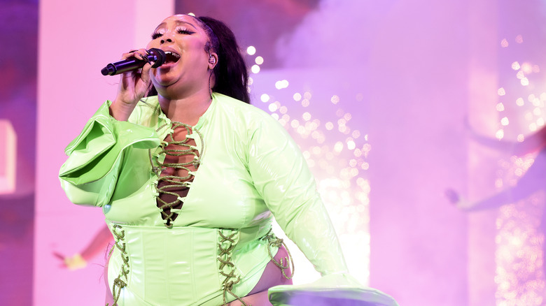 lizzo dancing in lime green