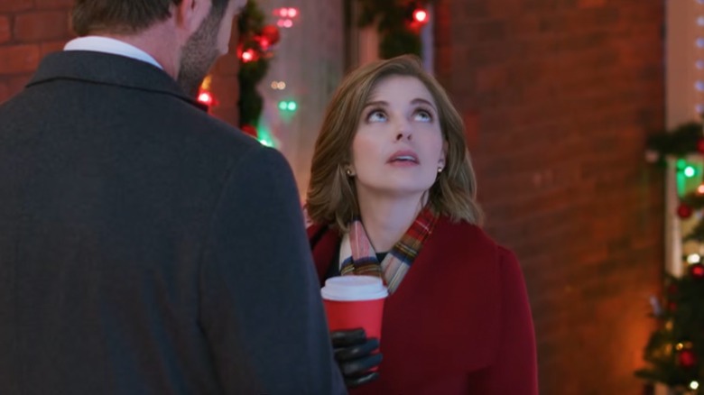 Jen Lilley looks up in "Love Under the Mistletoe"