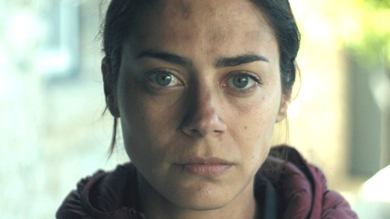 Lorenza Izzo playing Blair in The Aviary