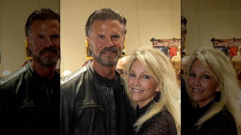 Lorenzo Lamas and Heather Locklear posing together and smiling.