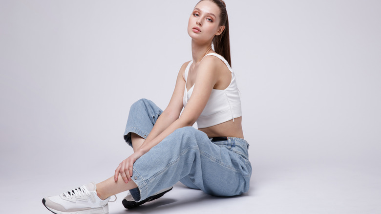 Woman sitting and posing