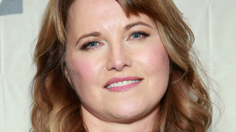 Lucy Lawless smiling