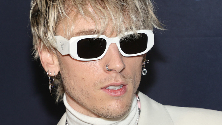 Machine Gun Kelly in sunglasses