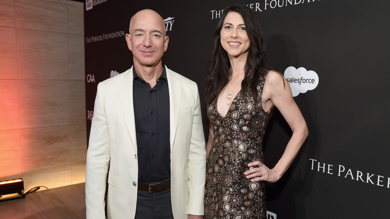 Mackenzie Scott and Jeff Bezos posing together at a glitzy event