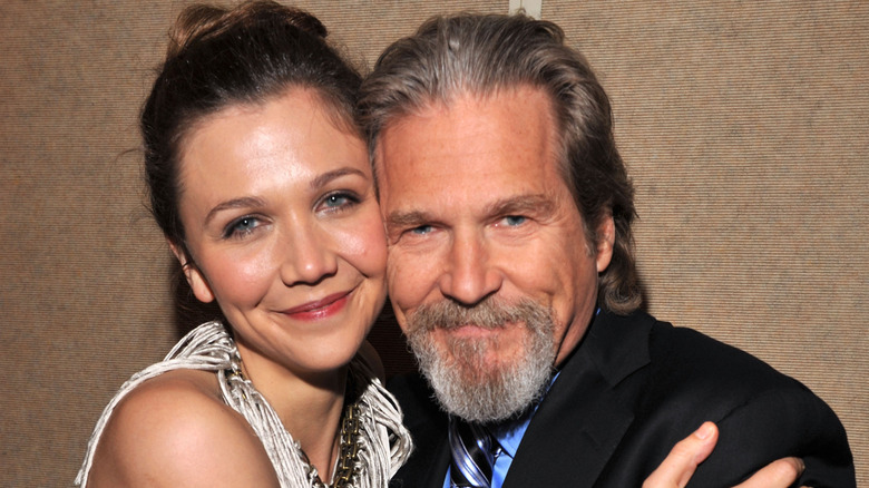 Maggie Gyllenhaal hugging Jeff Bridges.