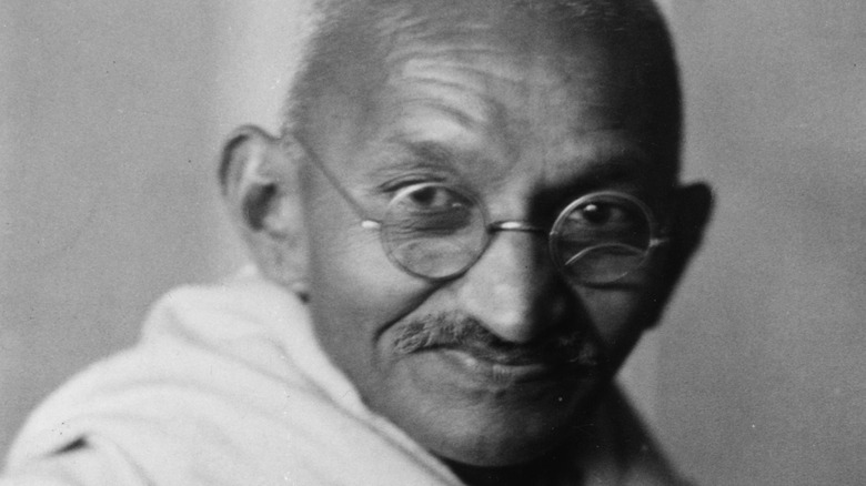 Mahatma Ghandi posing