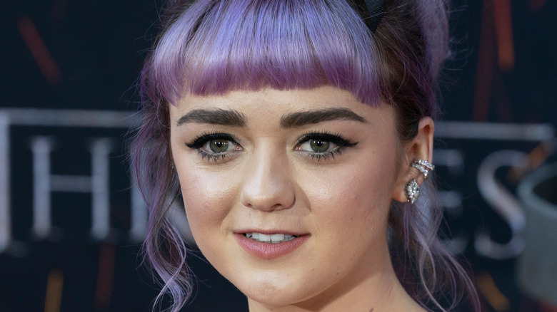 Maisie Williams poses on red carpet