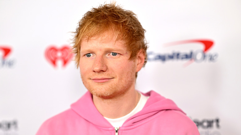 Ed Sheeran in a pink jacket