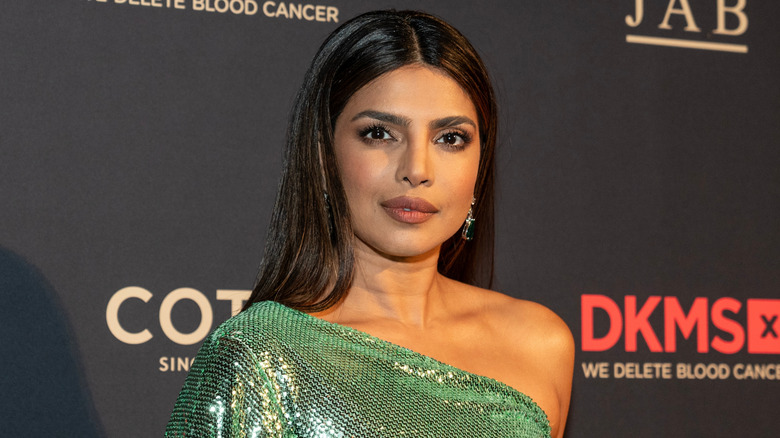 Priyanka Chopra Jonas in a green one-shoulder dress