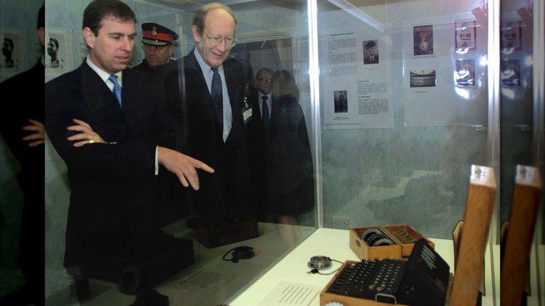 The former Prince Andrew examining World War II spy equipment