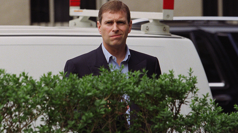 Prince Andrew smirking after a lunch date with Ghislaine Maxwell