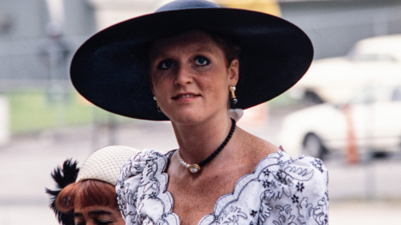 A young Sarah Ferguson looking up from under a wide-brimmed hat