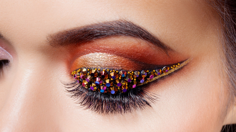 Disco eye makeup with rhinestones