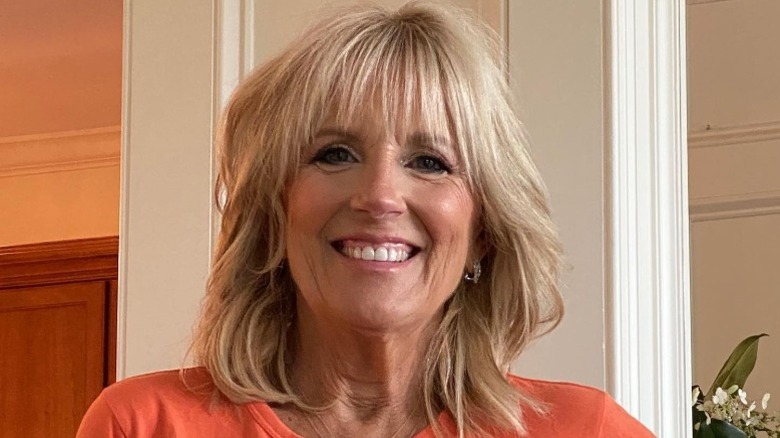 Jill Biden poses at home in a Philadelphia Flyers shirt (2020)