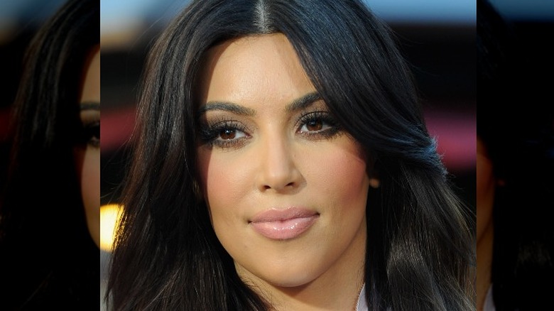 Kim Kardashian showing off a makeup trend this past decade