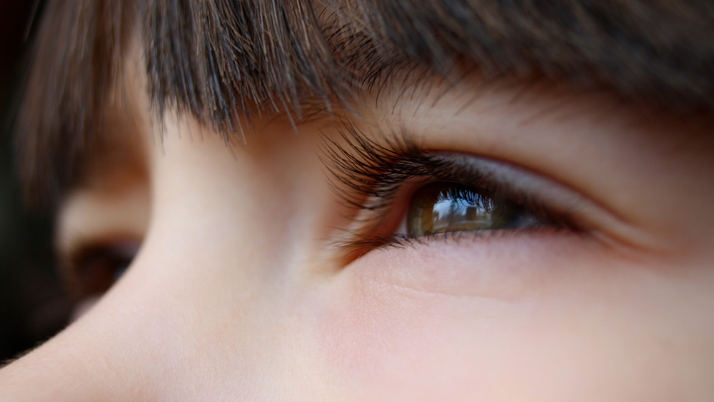 Woman with hooded eyes