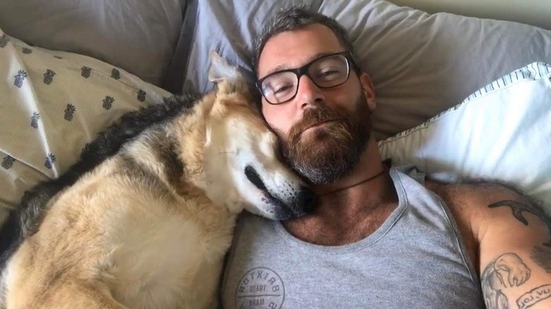 Kenny Brain selfie nuzzled up with dog