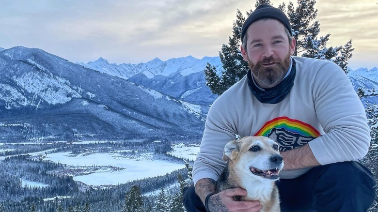 Kenny Brain with dog on mountain