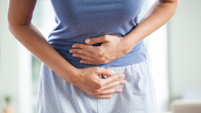 woman with stomach pains