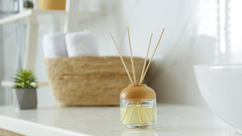 Reed diffuser on bathroom counter