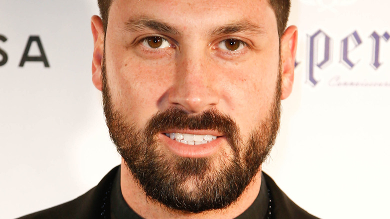 Maksim Chmerkovskiy with slight smile