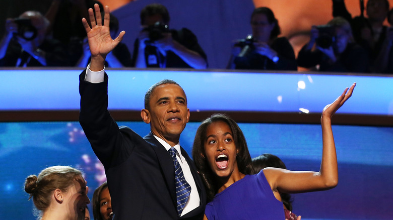Malia Obama celebrates with dad Barack Obama