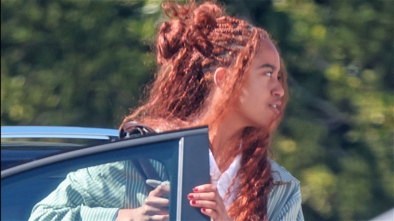 Malia Obama in LA with red hair pulled up