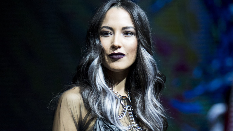 Woman with silver-and-black marbled hair