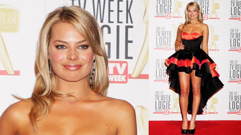 Margot Robbie wearing a black and orange dress