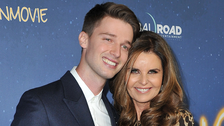 Patrick Schwarzenegger and Maria Shriver posing together