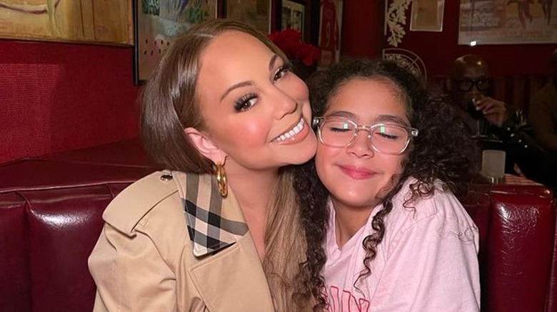 Mariah Carey and daughter Monroe smiling