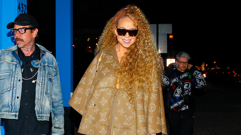 Mariah Carey walking in Aspen in sunglasses with her hair down