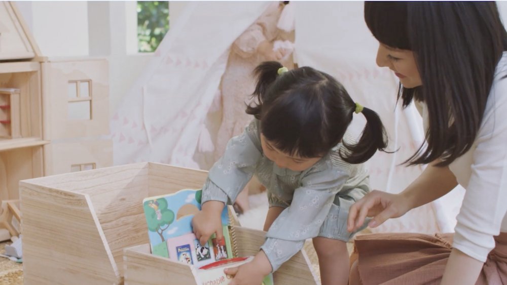 Kondo and daughter putting away books