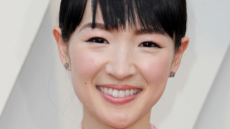 Marie Kondo smiling with bangs